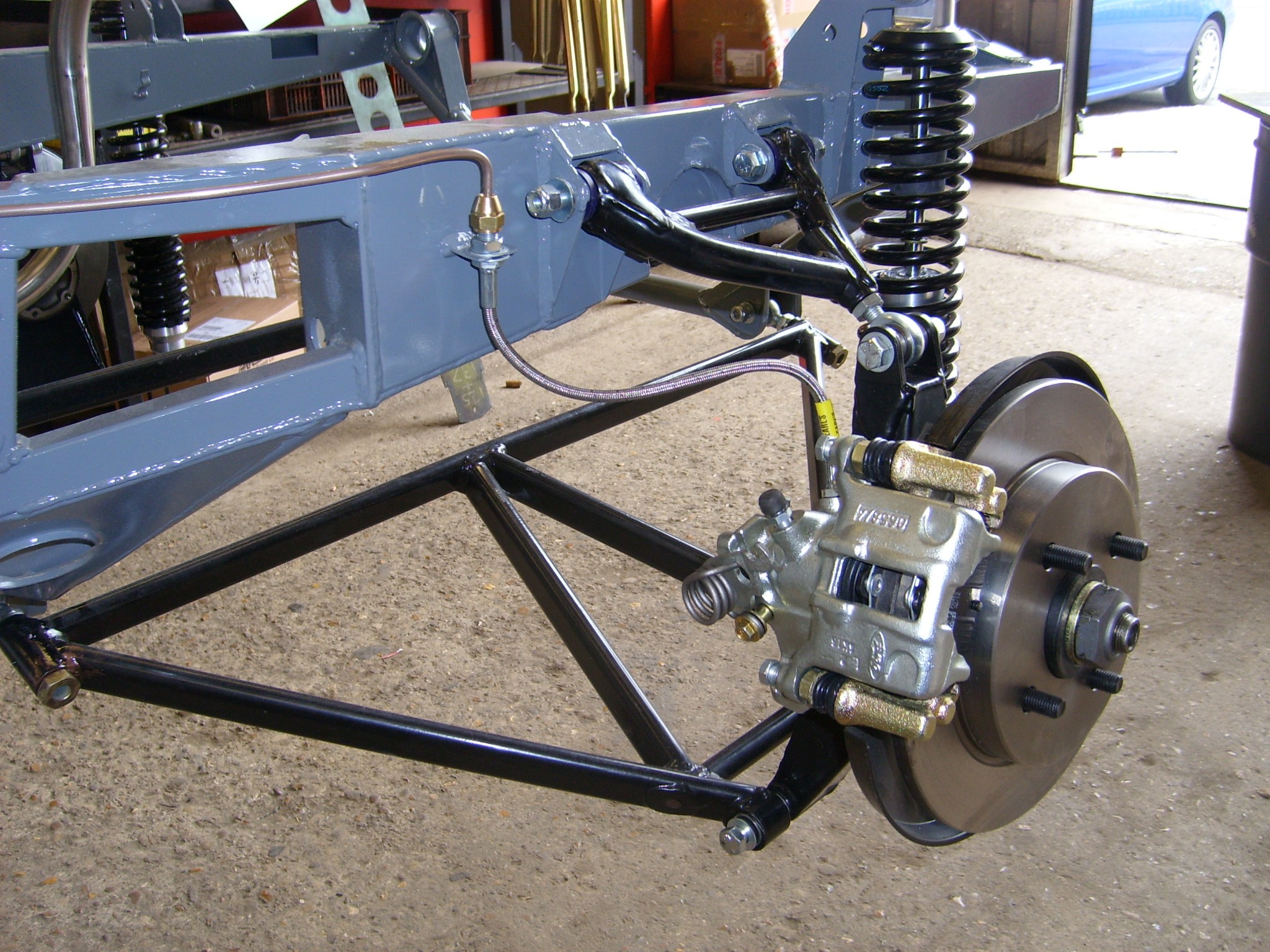 Rear upper adjustable wishbone. (Spyder Design)